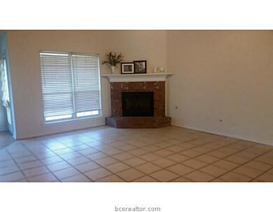 Living Room. Spacious living room with fireplace.