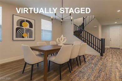 Dining space featuring a chandelier, wood finished