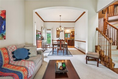 Living room flows to the Formal Dining Room