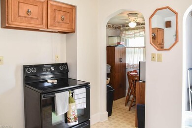 The kitchen comes applianced with an oven and rang