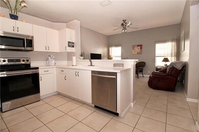 New SS appliances and bar counter top.
