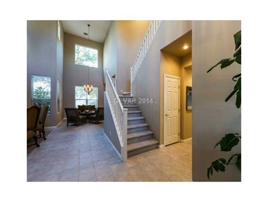 Entry Hall. Entrance opens to grand space. Living