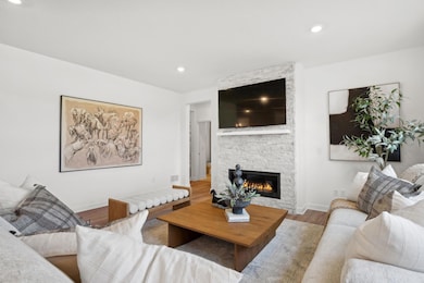 (Photo of model home, finishes will vary) Enjoy shared moments with loved ones in the comfortable and spacious Great Room, where expansive windows flood the space with natural light.