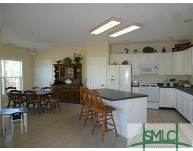 Kitchen. Large open living area with access to cov