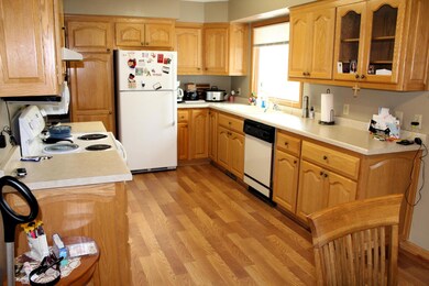 Kitchen w/large window facing backyard
