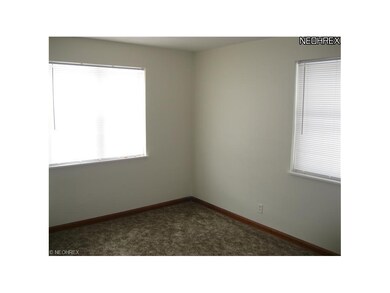 The front bedroom has two vinyl replacement window