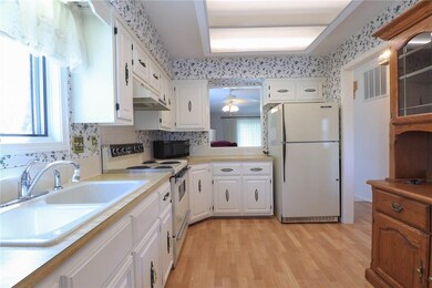Kitchen also includes a new garbage disposal and all appliances convey to buyer.