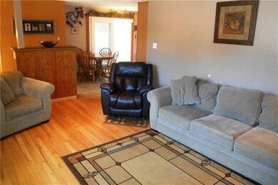 The living room opens directly into the kitchen an