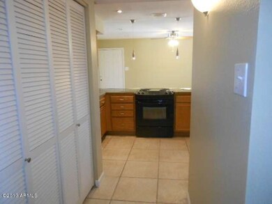 Hall in front of LR facing kitchen