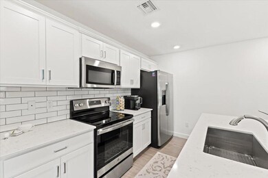 6019 Woods Edge Cir, Riviera Beach, FL 33410 - photo 7