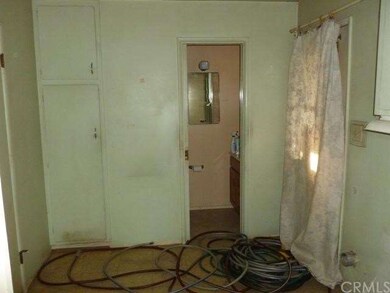 Laundry room in main house with 1/2 bath