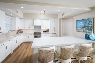 575 Avellino Isles Cir unit 102, Naples, FL 34119 - photo 2