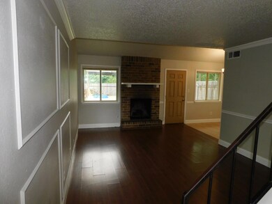 Unfurnished living room with a textured ceiling, 