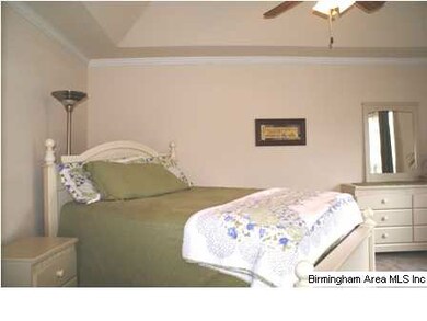 Large Master Bedroom with a vaulted ceiling.