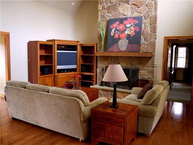 Living Room. Floor to ceiling Stone Wood burning f