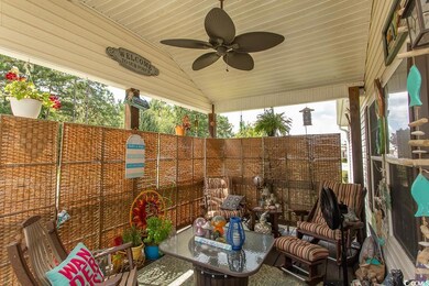 View of patio / terrace featuring ceiling fan