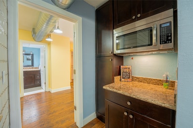 Plenty of cabinets for storage throughout the kitc