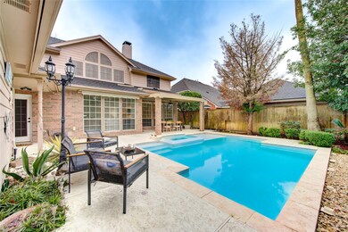The private pool and spa is surrounded by mature l