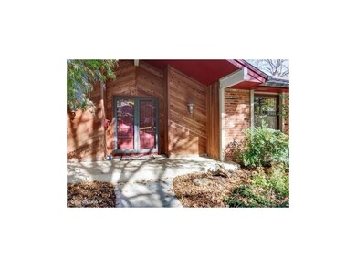 Wide front porch - wood planking and brick