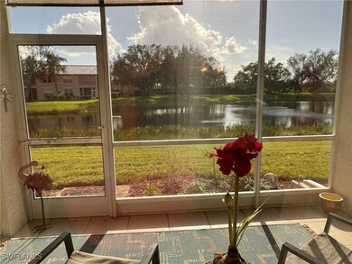 Sunroom / solarium with a water view