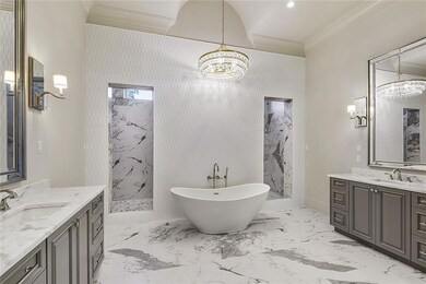 Two separate vanities with marble counters, stand