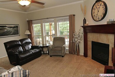 Comfortable living area with gas fireplace overloo