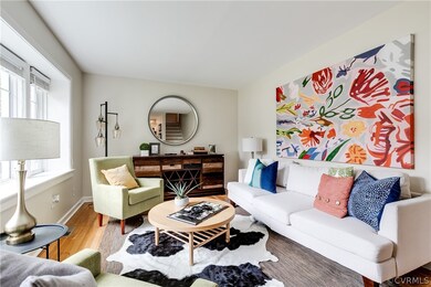 Living room with wood-type flooring and a healthy