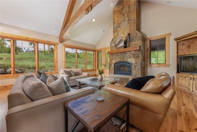 Expansive great room with a wall of windows.