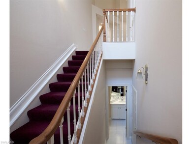 Stairway up to main living area and 3rd full bath 