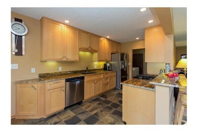 Kitchen. Kitchen has jenn air gas stove, Maytag re