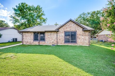 Single story home with a front yard