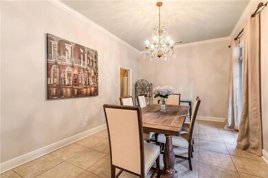 LARGE DINING ROOM WITH TILE FLOORS