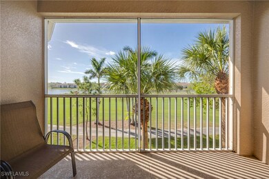 Sunroom with a water view