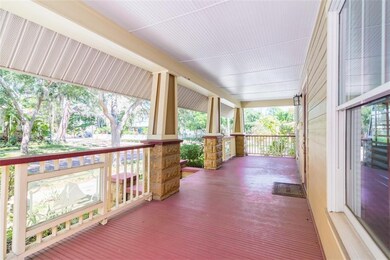 Large front porch spans entire width of house.
