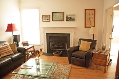 Gas fireplace serves as the main focus of the fami