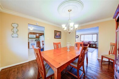gorgeous spacious dining room with crown molding