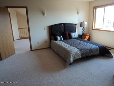 master bedroom with office in background