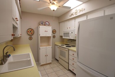 Tiled Kitchen with Ceiling Fan