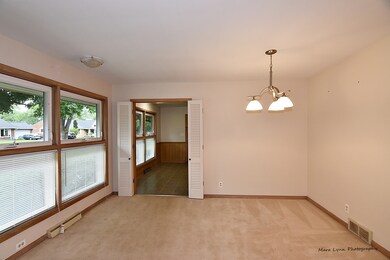 Spacious Dining room with updated lighting