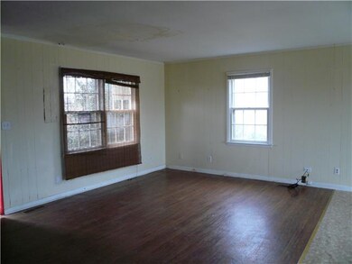 Open living and dining areas with view of the lake!