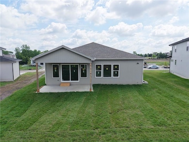 4624 SW Robinson Dr, Raymore, MO 64083 - photo 4