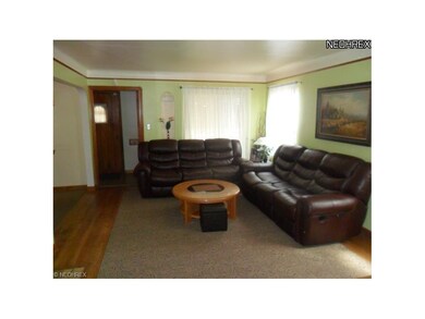 Another view of your spacious living room.
