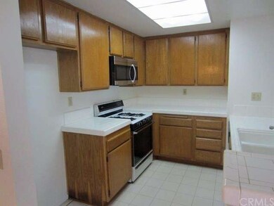 Open kitchen design with new microwave and dishwas