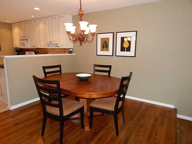 Dining Room. An elegant chandelier illuminates the
