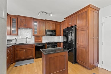 Island and pantry with pull out shelving