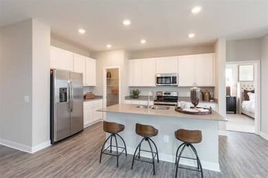 The Ashbury has an open kitchen and deep corner pa