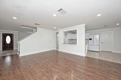 Unfurnished living room with baseboards, ornament