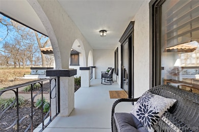 Fabulous front and back sitting porches to enjoy t