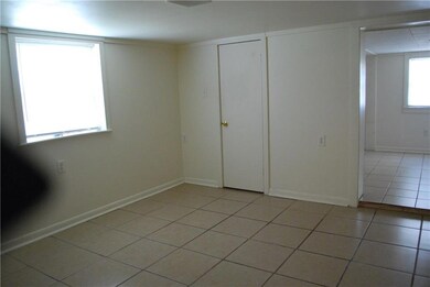 Bedroom #2: Shot gun style... Light-filled, tile floors....
