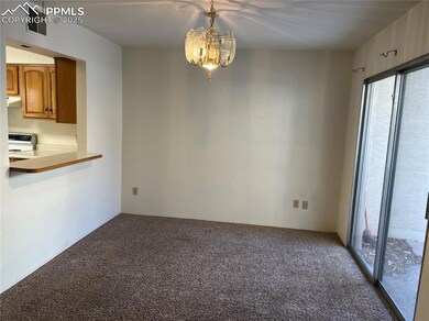 Unfurnished dining area with a chandelier and carp